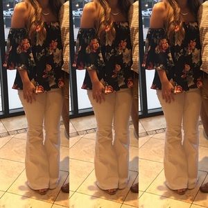 Silky navy floral off the shoulder top. Super flowy.